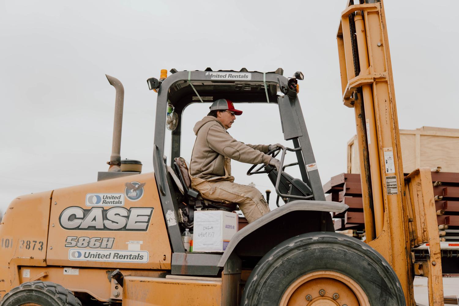 Man-driving-construction-equipment